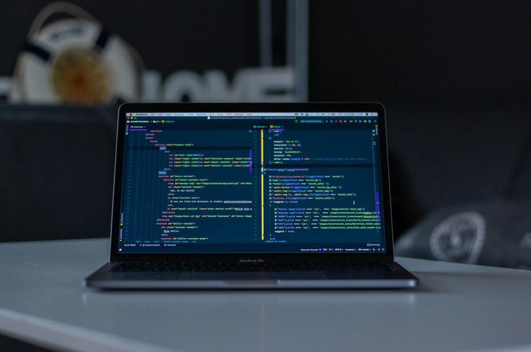 laptop with code editor