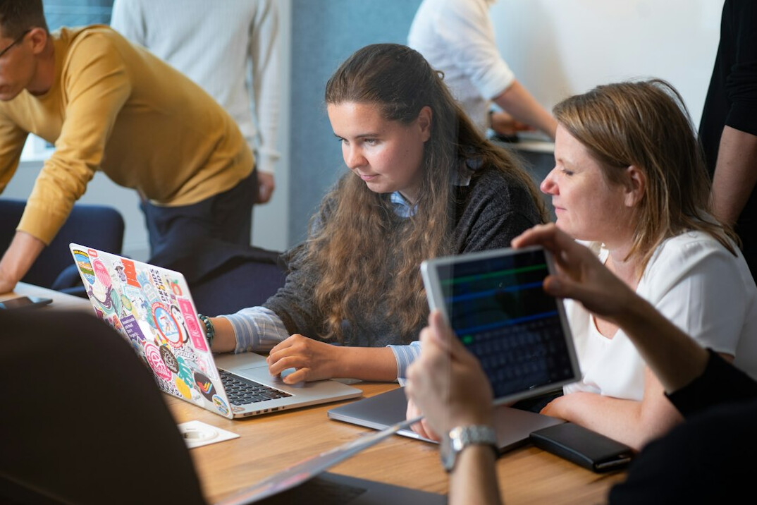 students discussing code