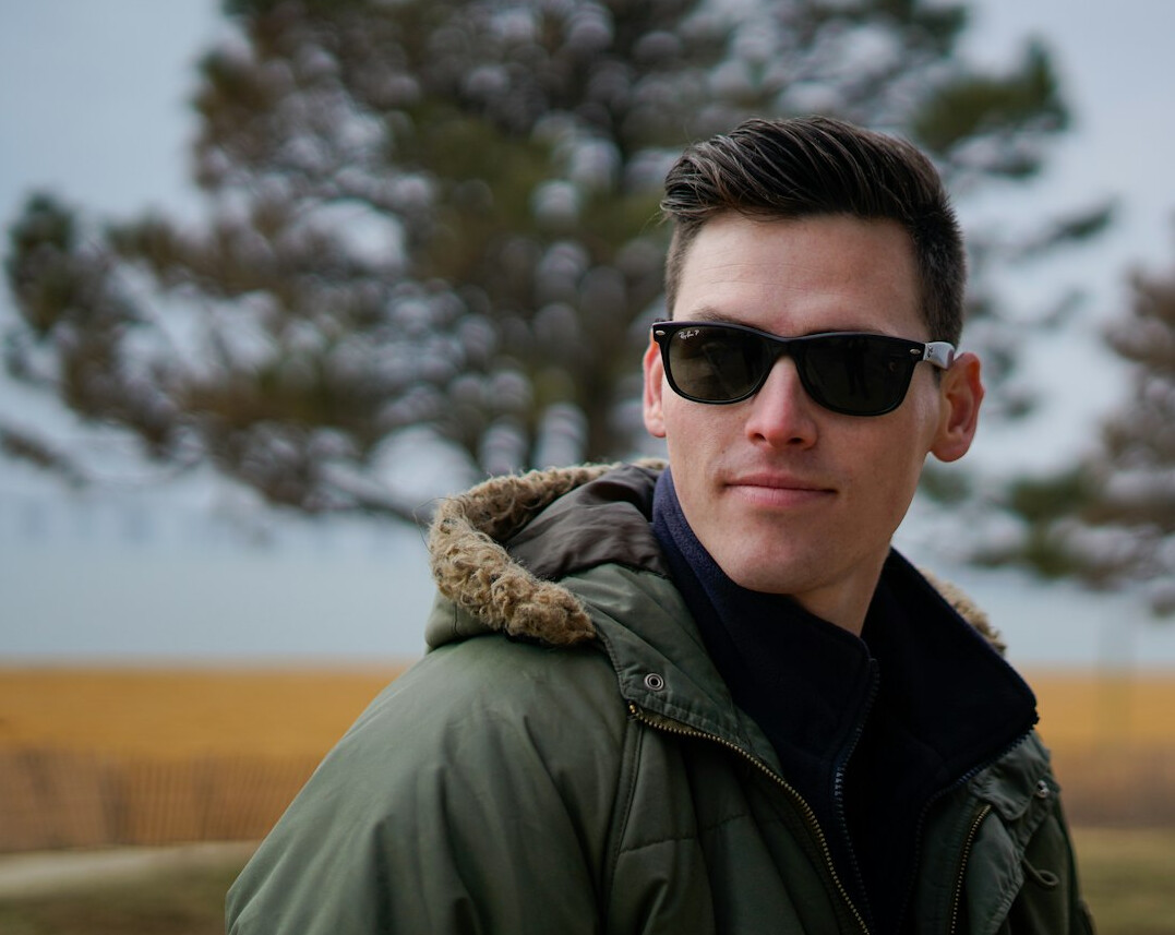 Young Croatian man with glasses smiling