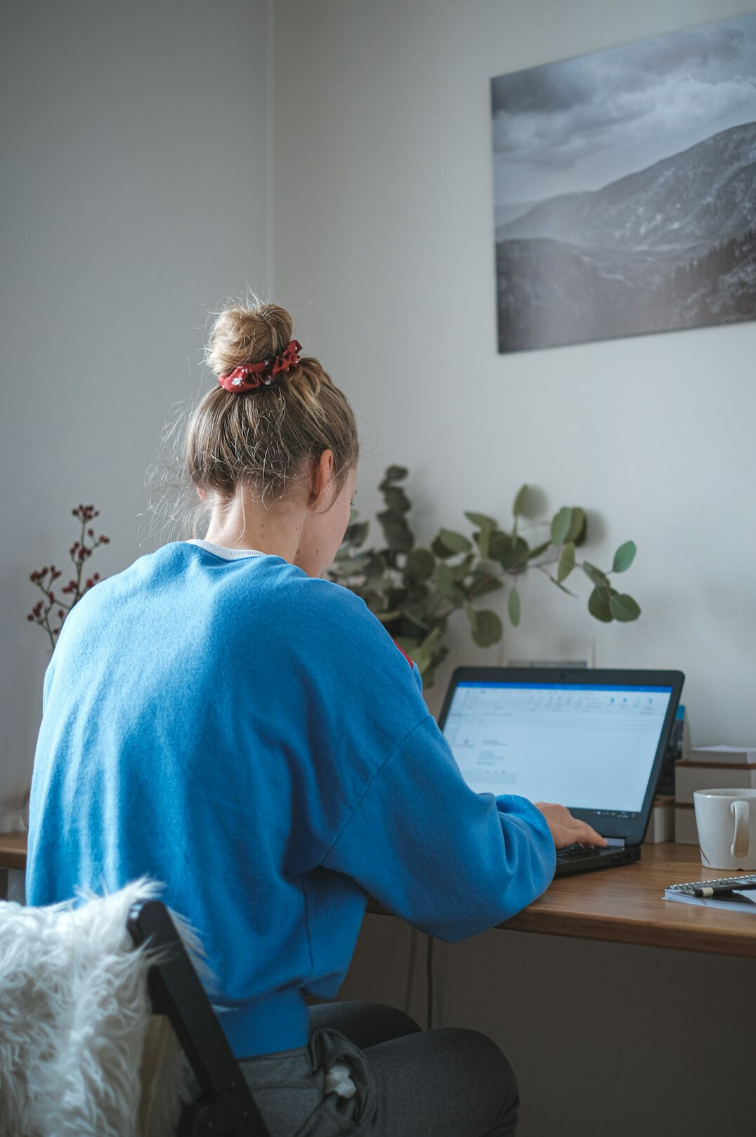 person working on code at home